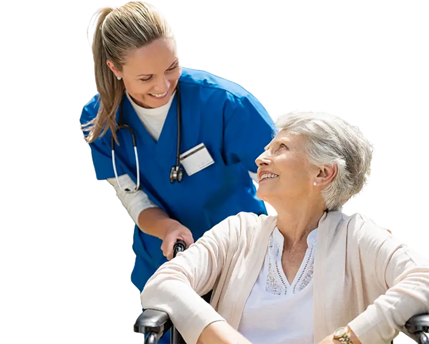 A nurse assists an elderly woman in a wheelchair, providing support and care in a healthcare setting.