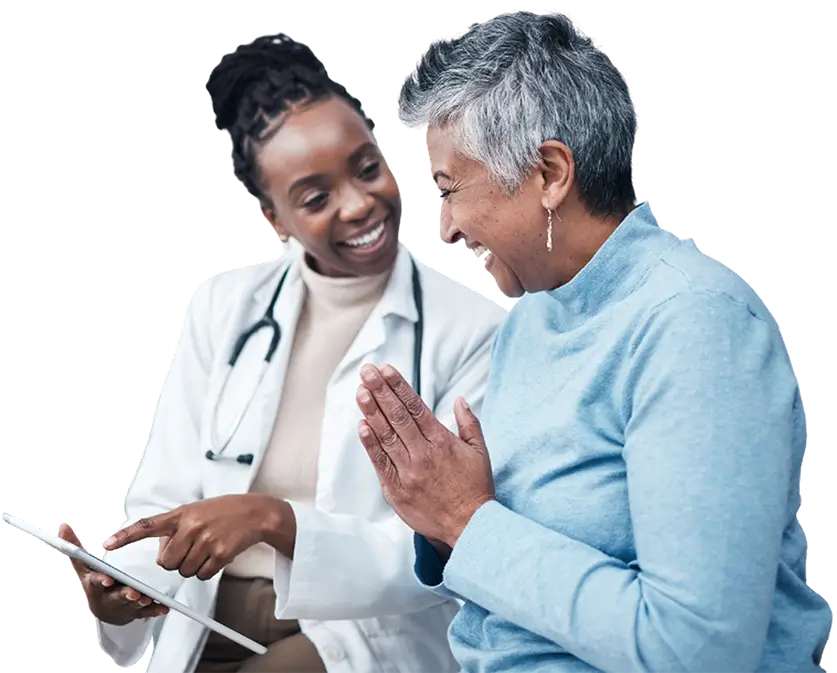 A doctor and patient engaged in a conversation via a tablet, highlighting telehealth communication.