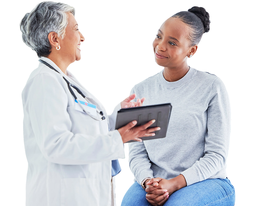 A doctor shows a patient information on a tablet device