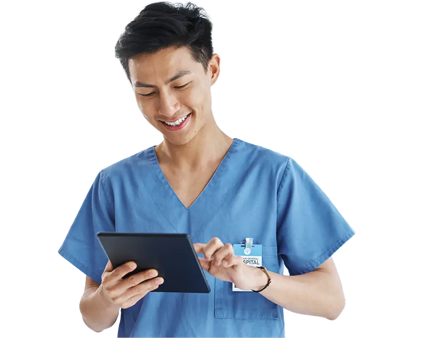 Man in blue scrubs with tablet device